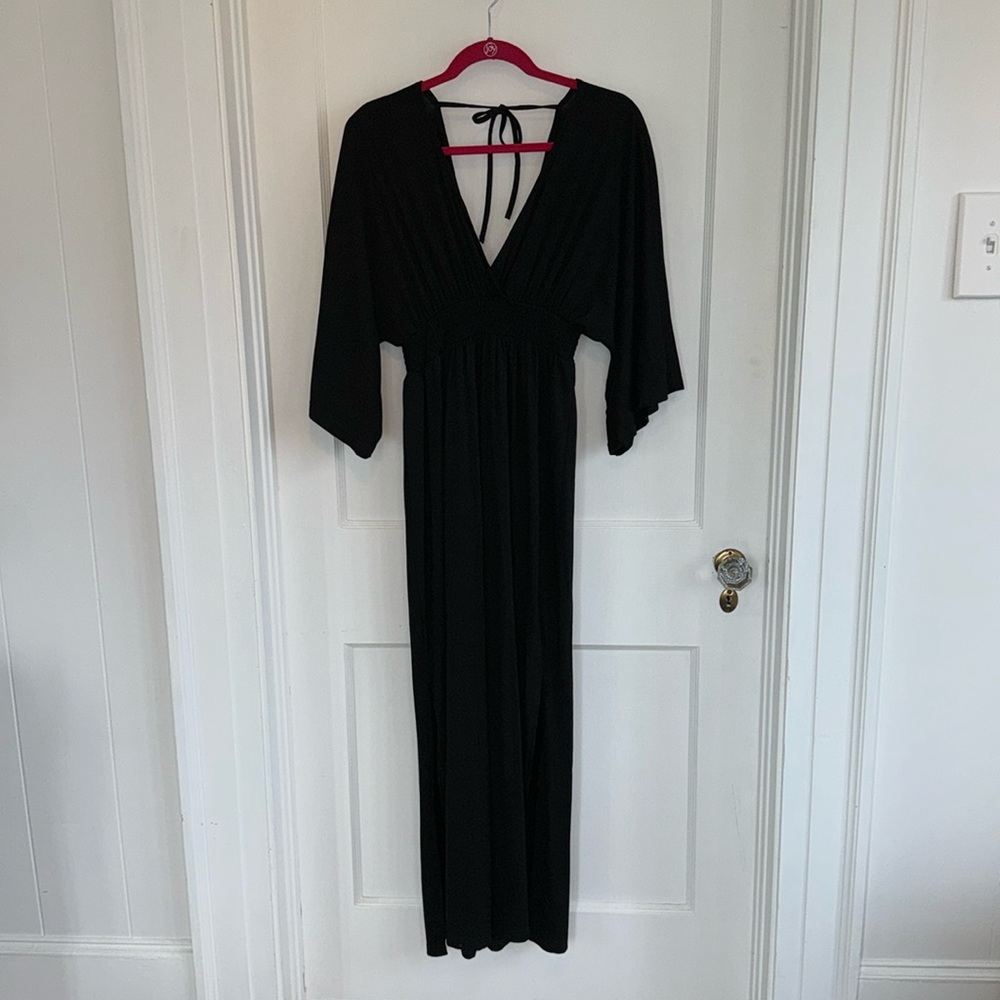 Black maxi w/tie back & side slits. Plunging neckline. 40"  from smocked bodice